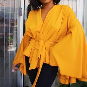 Bell sleeve wrap blouse